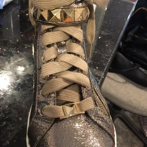 Michael Kors fashion sneakers, wear and tear on the edges . No box